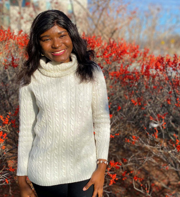 Dorcas Lohese poses outside in the UVM Med Center roundabout